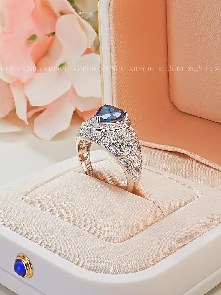 Luxury Heart-Shaped Lab Created Sapphire Big Rings with AAAAA High Carbon Diamond inlay, Versatile in Niche Design - The Jewellery Supermarket