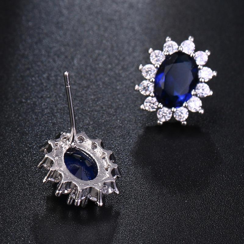 Stunning Blue or Red Oval Zircon Stud Earrings - Best Online Prices - The Jewellery Supermarket