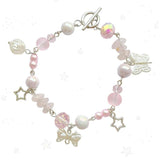 Handcrafted  rose quartz, pink pearls, star charms, frosted pink rainbow beads, butterflies, bows, roses Charm Bracelet