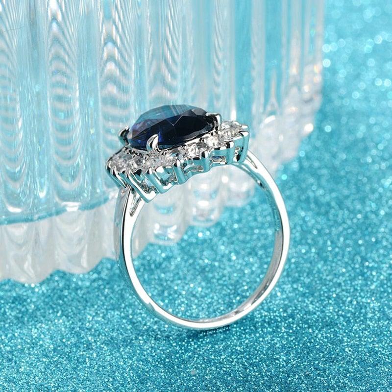 Superb Flower shaped Oval Lab Sapphire Rings - The Jewellery Supermarket
