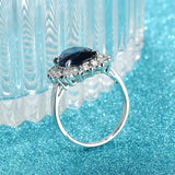Superb Flower shaped Oval Lab Sapphire Rings - The Jewellery Supermarket